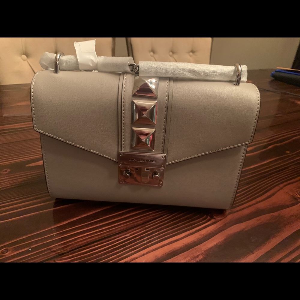 Brand new Michael Kors nude and silver purse